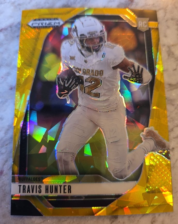 2025 Panini Prizm Draft Picks #21 Travis Hunter Gold Ice Prizm Rookie — front