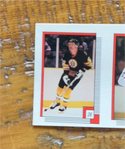 1987-88 O-Pee-Chee Sticker #28 Cam Neely — front