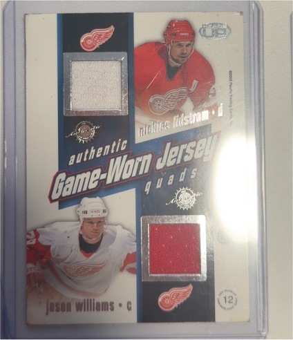 2002-03 Pacific Heads Up #12 Dominik Hasek / Brett Hull / Nicklas Lidstrom / Jason Williams Game-Worn Jersey Quads — front