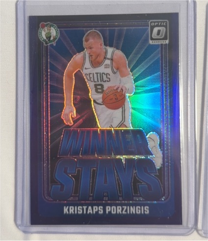 2024-25 Panini Donruss Optic #9 Kristaps Porzingis Winner Stays — front