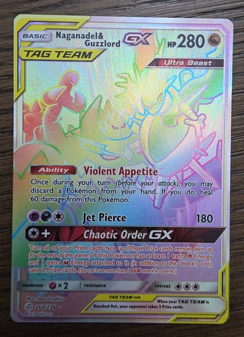 2019 Pokémon TCG Cosmic Eclipse #260 Naganadel & Guzzlord GX — front