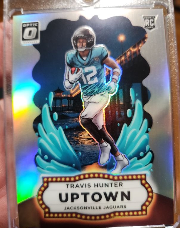 2025 Panini Donruss Optic #21 Travis Hunter Uptown Rookie Jacksonville Jaguars — front