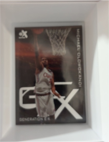 1999-00 Skybox E-X Generation E-X #1GX Michael Olowokandi — front