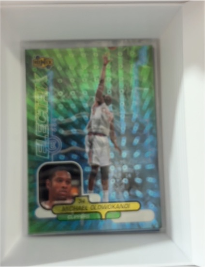 1998-99 Upper Deck Ionix Electrix #61 Michael Olowokandi Rookie Card — front