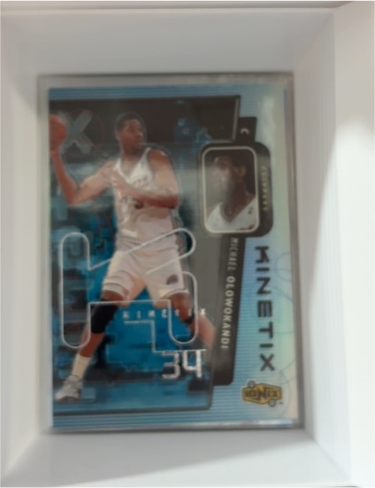 1998-99 Upper Deck Ionix Kinetix #K2 Michael Olowokandi — front