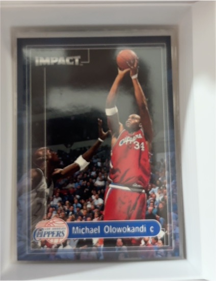 1999-00 Skybox Impact #128 Michael Olowokandi — front