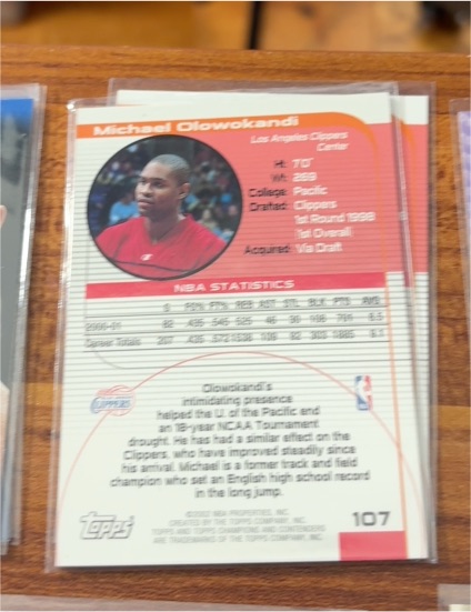 1999 Topps #107 Michael Olowokandi — front