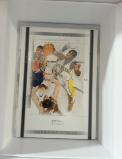 1999 Skybox Premium #8/C Jermaine O'Neal — front