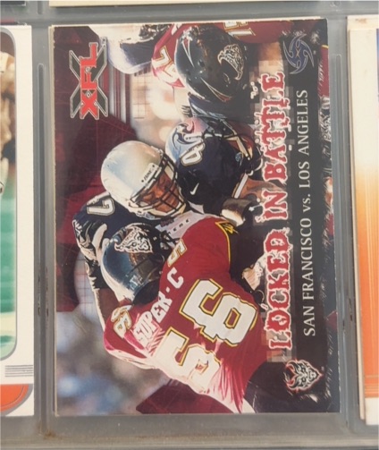 1999 Pacific X-Force #X Junior Seau Locked In Battle — front