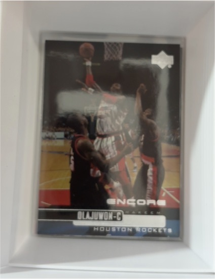 1999-00 Upper Deck Encore #28 Hakeem Olajuwon — front