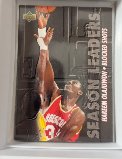 1993-94 Upper Deck #170 Season Leaders Blocked Shots Hakeem Olajuwon — front