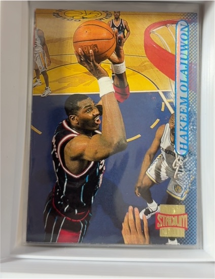 1996-97 Topps Stadium Club #123 Hakeem Olajuwon — front