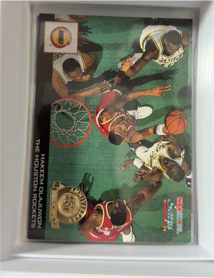 1993-94 SkyBox Hoops Scoops #HS10 Hakeem Olajuwon — front