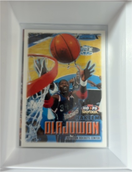 1999-00 Skybox NBA Hoops #117 Hakeem Olajuwon — front