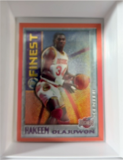 1995-96 Topps Finest #M21 Hakeem Olajuwon — front
