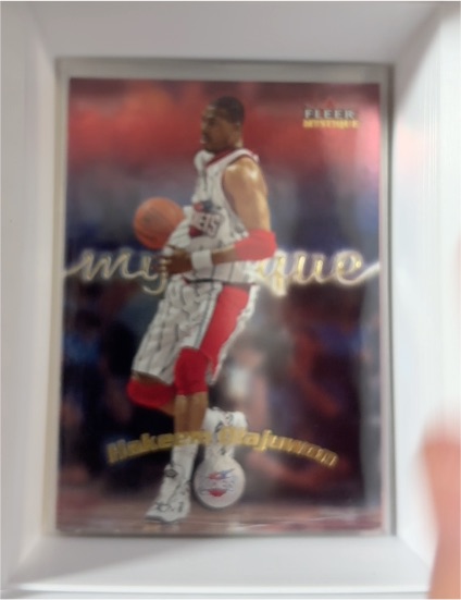 2000-01 Fleer Mystique #68 Hakeem Olajuwon — front