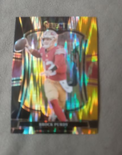 2025 Panini Select Premier Level #117 Brock Purdy — front