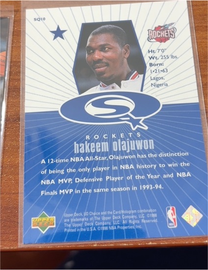 1998-99 Upper Deck UD Choice StarQuest #SQ10 Hakeem Olajuwon — front