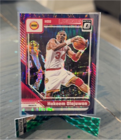 2024-25 Panini Donruss Optic #249 Hakeem Olajuwon Pink Hyper Prizm Houston Rockets — front
