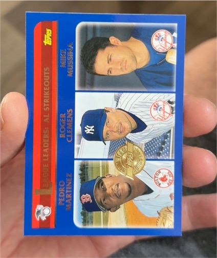 2003 Topps #342 AL Strikeout Leaders Roger Clemens, Pedro Martinez, Mike Mussina — front