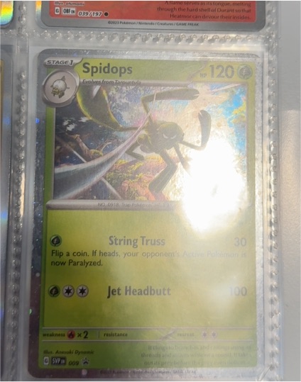 2023 Pokémon SV Black Star Promo #009 Spidops — front