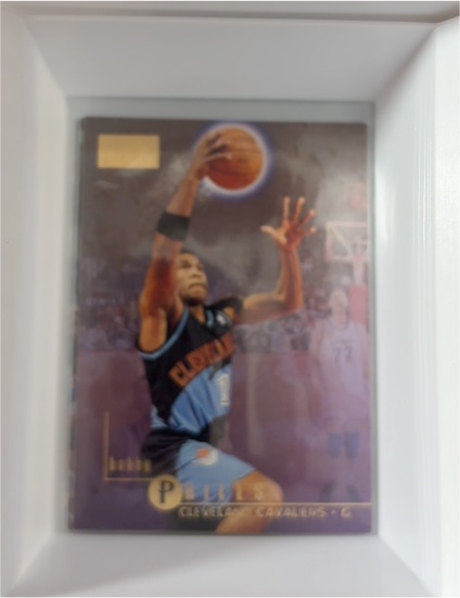 1996-97 SkyBox Premium #23 Bobby Phills — front