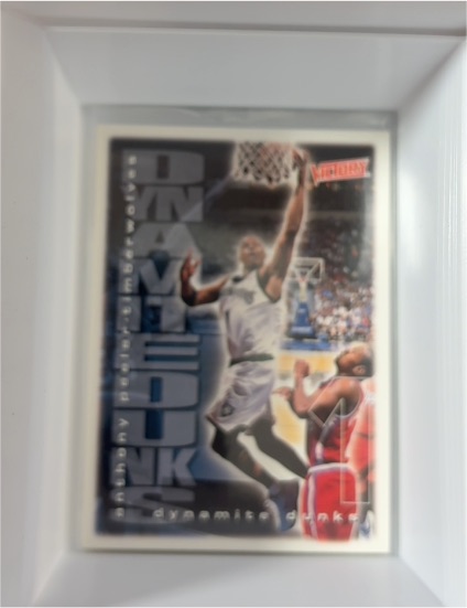 1999-00 Upper Deck Victory Dynamite Dunks Dikembe Mutombo — front