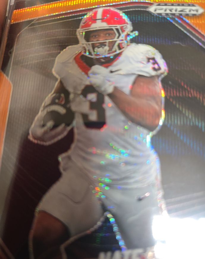 2025 Panini Prizm Black Football Carnell Tate Rookie Orange Wave SSP #/60 — front
