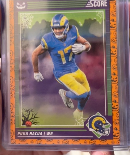 2024 Panini Score-A-Treat #156 Puka Nacua Orange Pumpkins — front