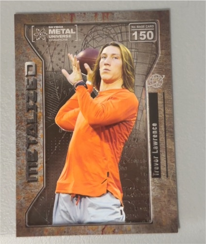 2021 Skybox Metal Universe Champions #150 Trevor Lawrence — front