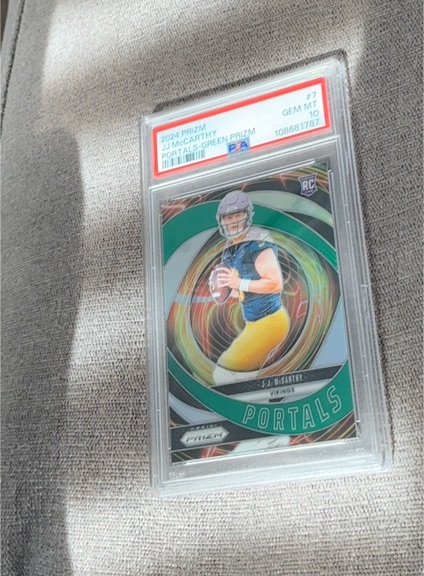 2024 Panini Prizm #7 J.J. McCarthy Portals Green Wave Prizm Rookie — front