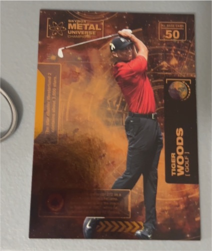 2021 Skybox Metal Universe Champions #50 Tiger Woods — front