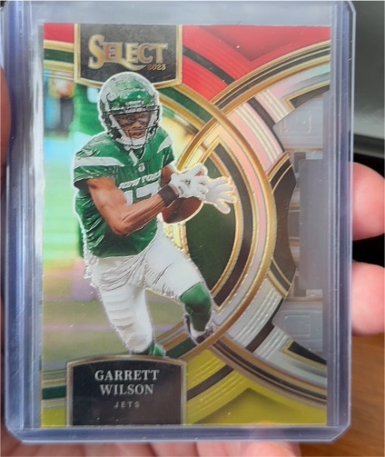 2023 Panini Select #115 Garrett Wilson Red & Yellow Prizm Premier Die-Cut — front