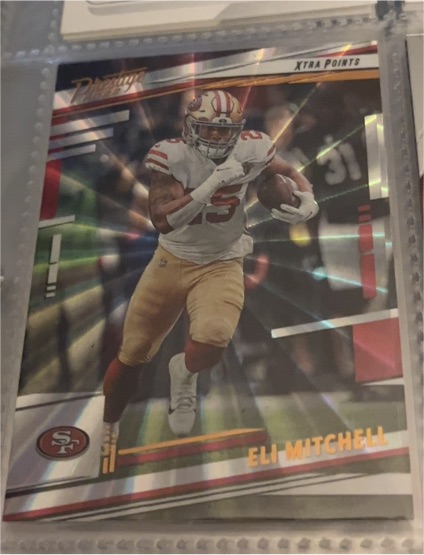2022 Panini Prestige #265 Eli Mitchell Xtra Points Sunburst — front