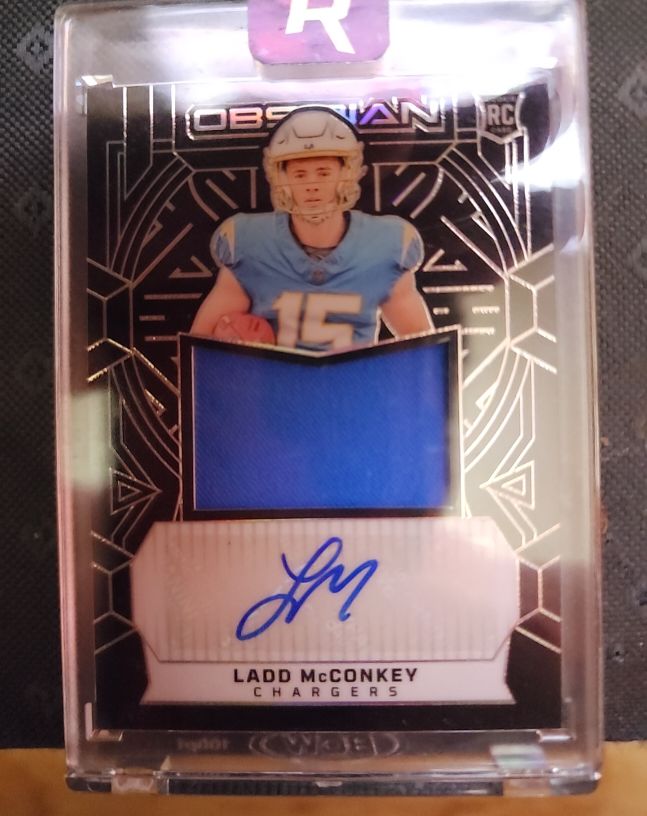2024 Panini Obsidian #RJJ-LMY Ladd McConkey — front