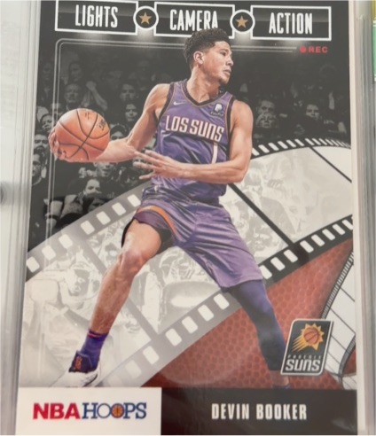 2019-20 Panini NBA Hoops Lights Camera Action #25 Devin Booker — front