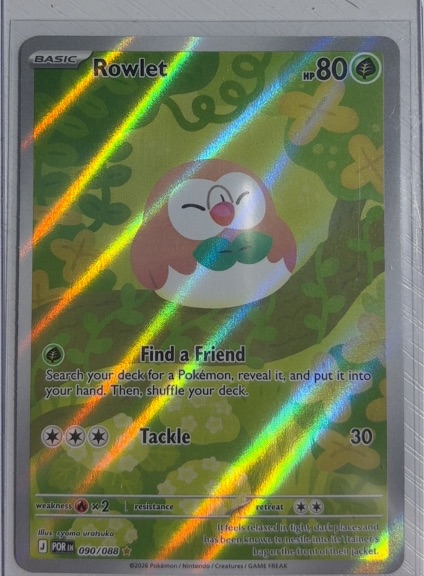 2016 Pokémon POR #090 Rowlet — front