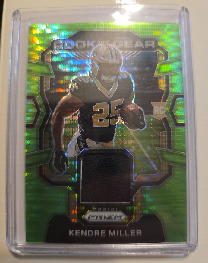 2023 Panini Prizm #RG-KM Kendre Miller Rookie Gear Neon Green Pulsar Prizm — front