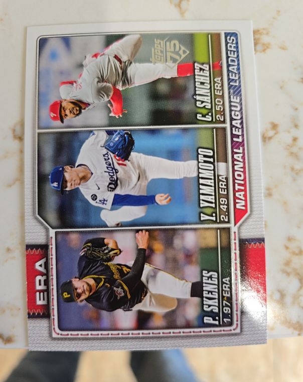 2026 Topps Series 1 #203 National League ERA Leaders Paul Skenes, Yoshinobu Yamamoto, Cristopher Sanchez — front
