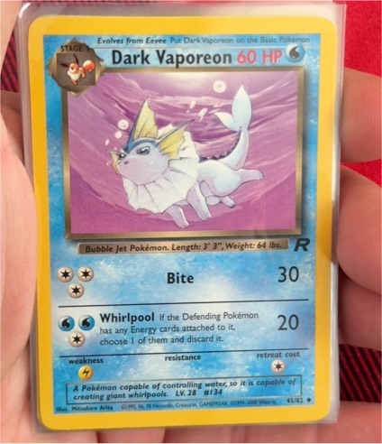 1999 Pokémon Team Rocket #45 Dark Vaporeon — front