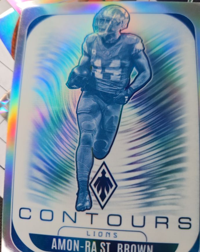 2025 Panini Phoenix Contours #11 Amon-Ra St. Brown — front