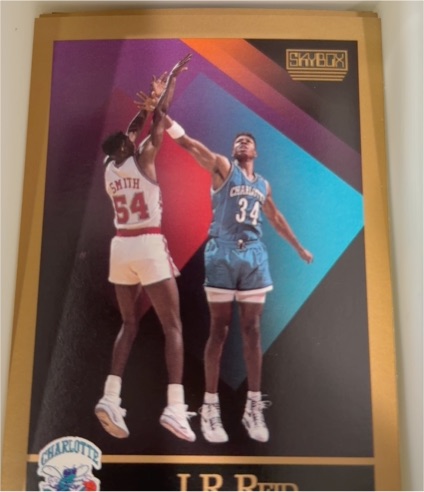 1990-91 Skybox Basketball #32 J.R. Reid — front