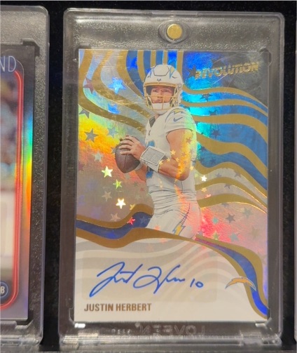 2025 Panini Revolution Revolution Signatures #RSA-JHT Justin Herbert — front