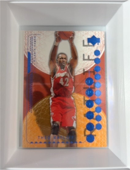 2003-04 Upper Deck Triple Dimensions #2 Theo Ratliff — front