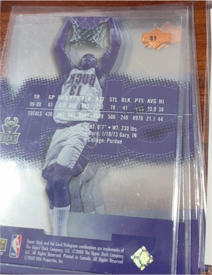 2003-04 Upper Deck Triple Dimensions #31 Glenn Robinson — front