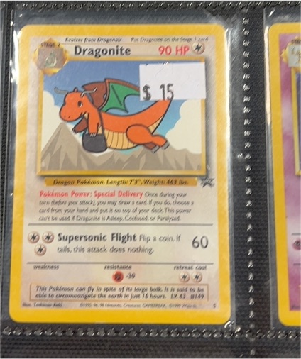 1999 Pokémon #5 Dragonite Black Star Promo — front