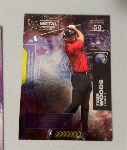 2021 Skybox Metal Universe Champions #50 Tiger Woods — front