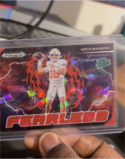 2025 Panini Prizm Draft Picks #F-AMG Arch Manning Fearless Red Ice — front