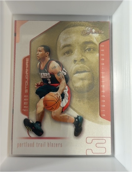 2001 Flair #11 Damon Stoudamire — front