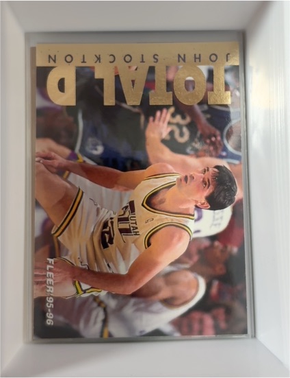 1995-96 Fleer #12 John Stockton Total D — front